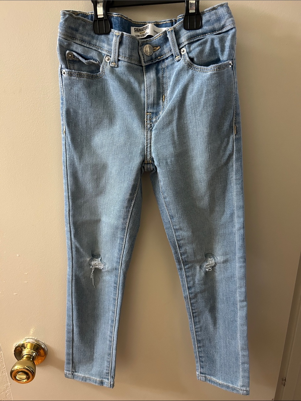Signature Light Blue Skinny Jeans with Knee Rips